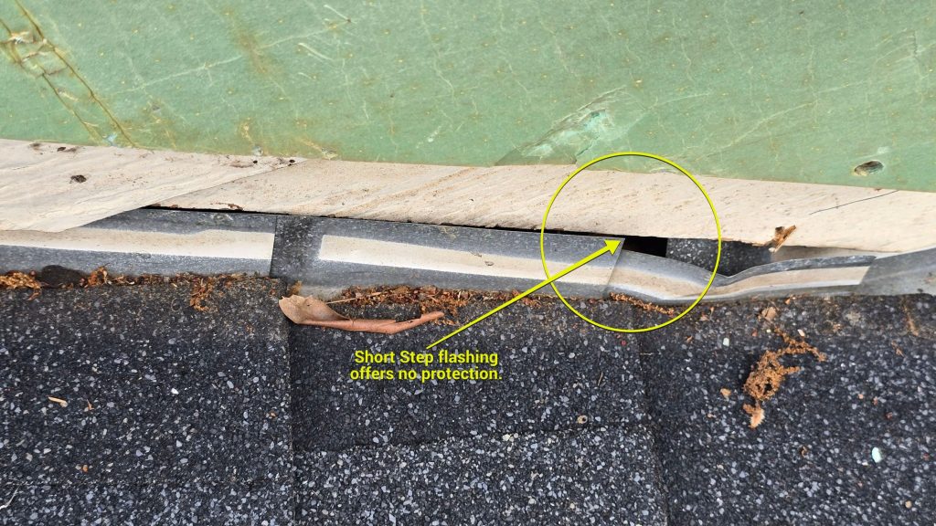 Short step flashing failure at chimney Raleigh NC