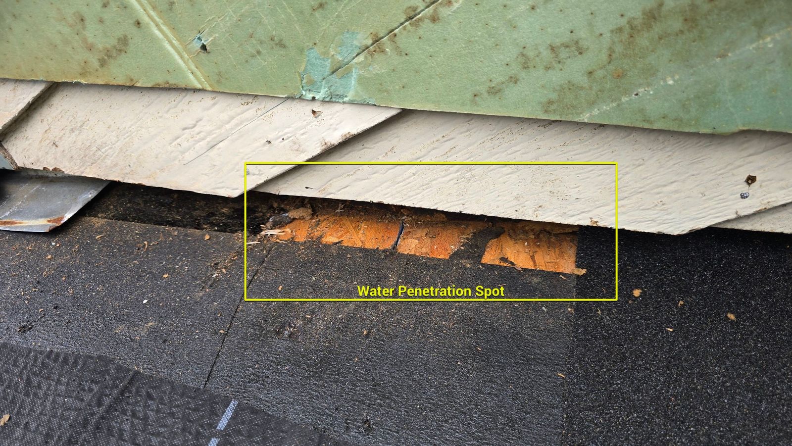 Water penetration spot from failed chimney flashing Raleigh NC