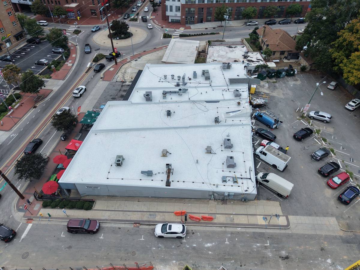 Full flat roof replacement on Hillsborough Street in Raleigh by Simple Construction Roofing