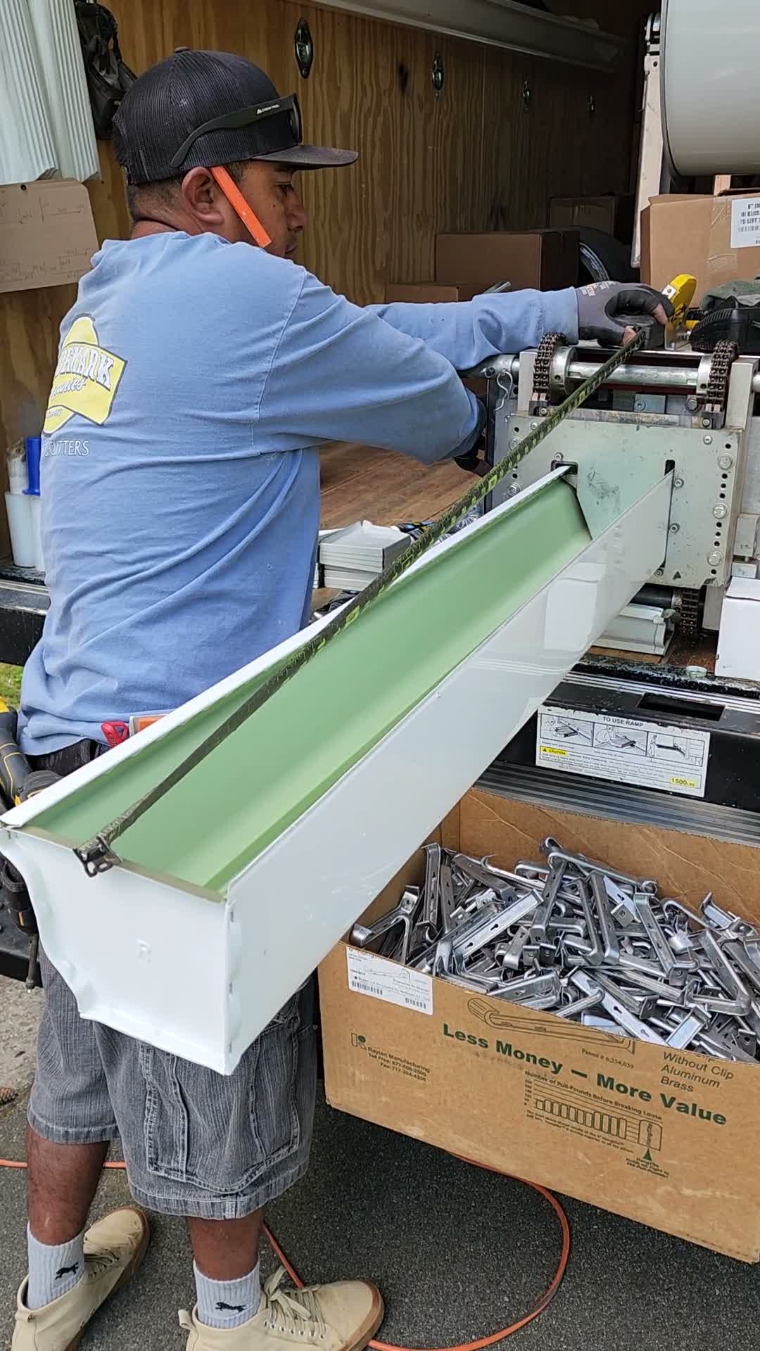 Seamless gutter machine forming custom gutters on site