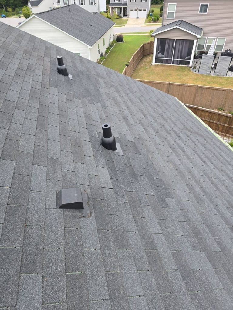 Finished pipe boot and vent repairs on shingle roof - after repair Raleigh NC