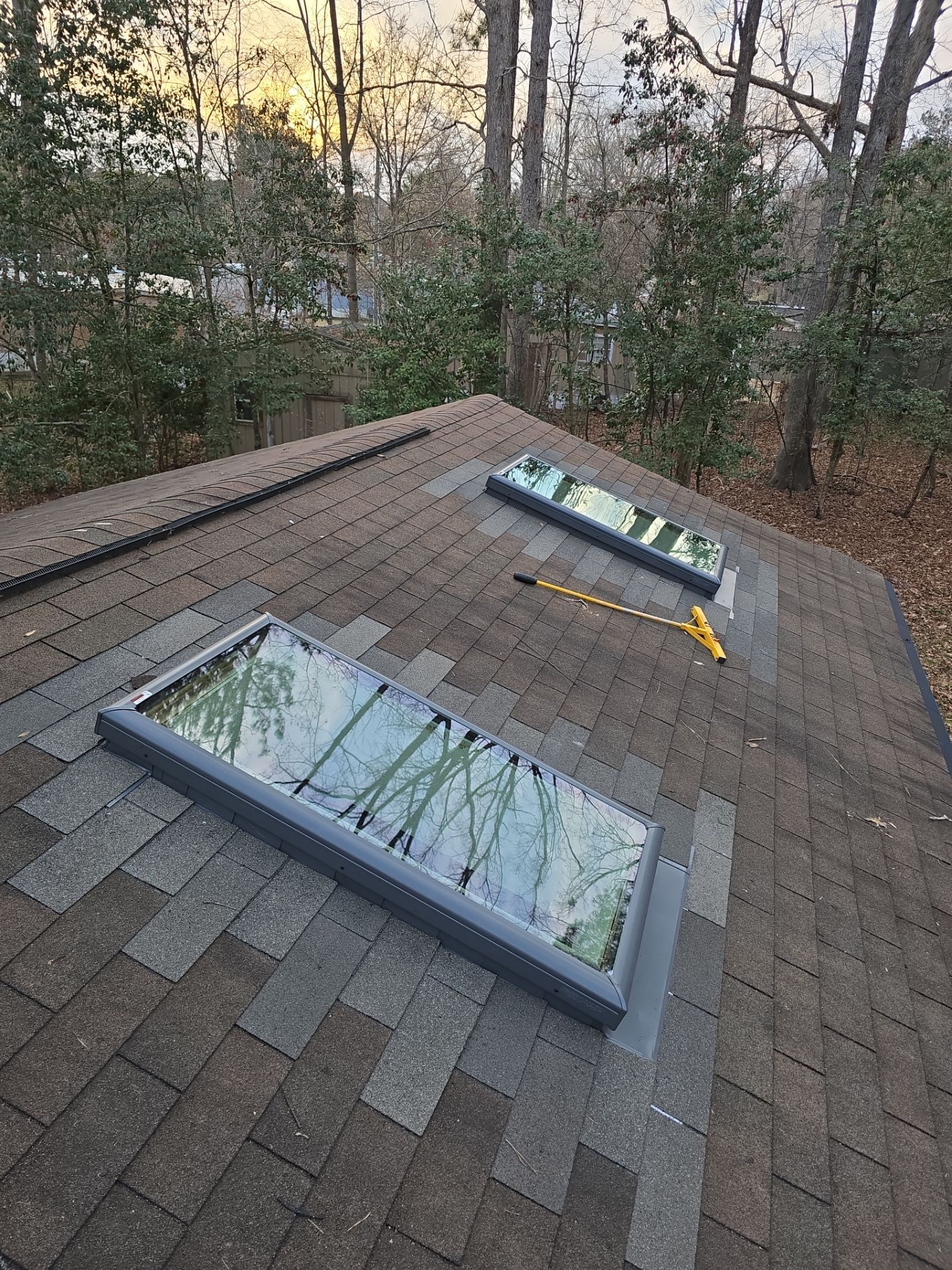 New skylights installed on shingle roof Raleigh NC