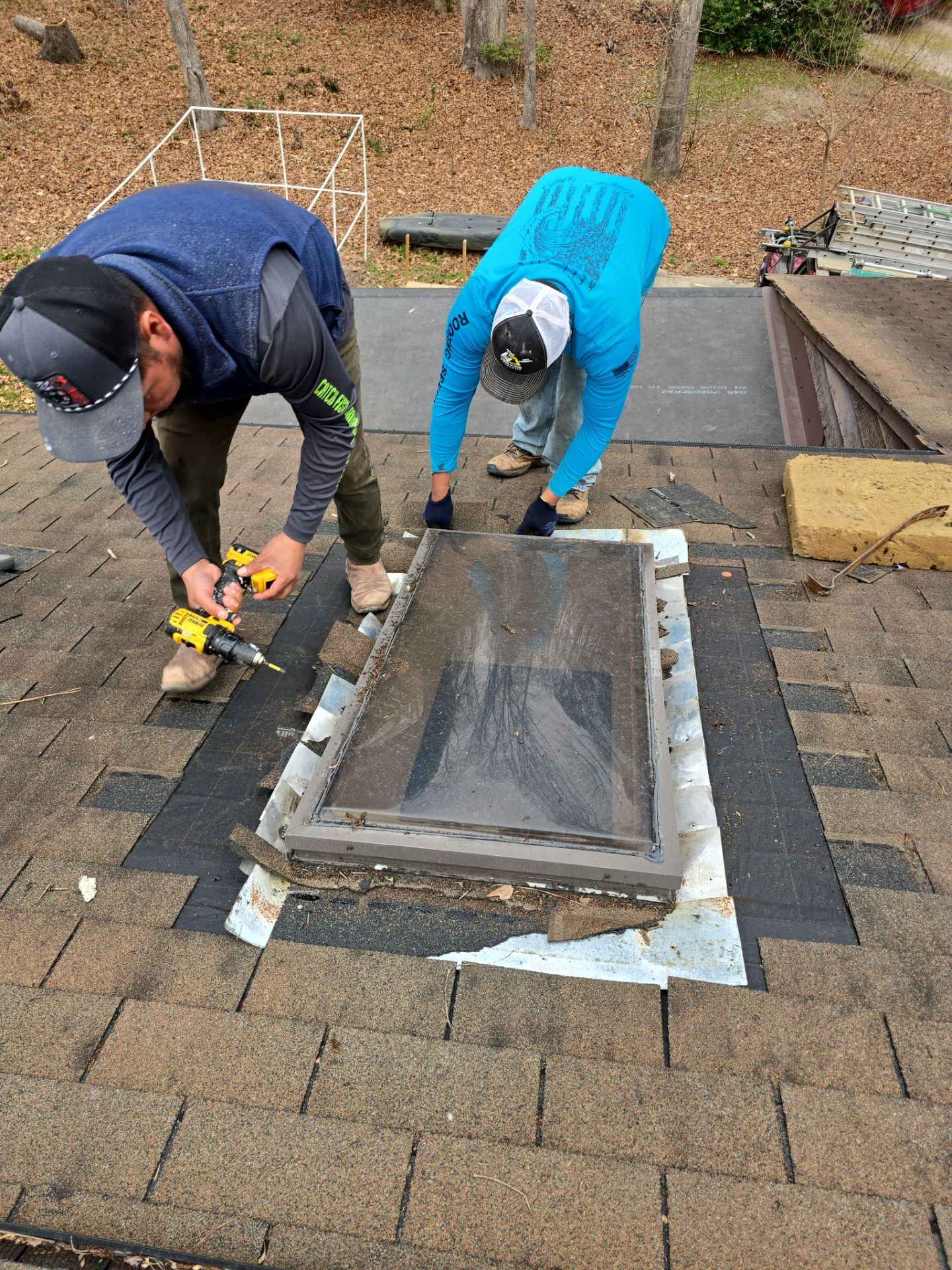 Workers installing skylight flashing Raleigh NC