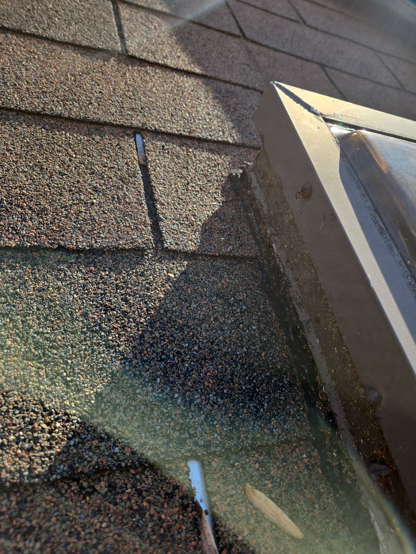 Skylight flashing detail with shingles Raleigh NC
