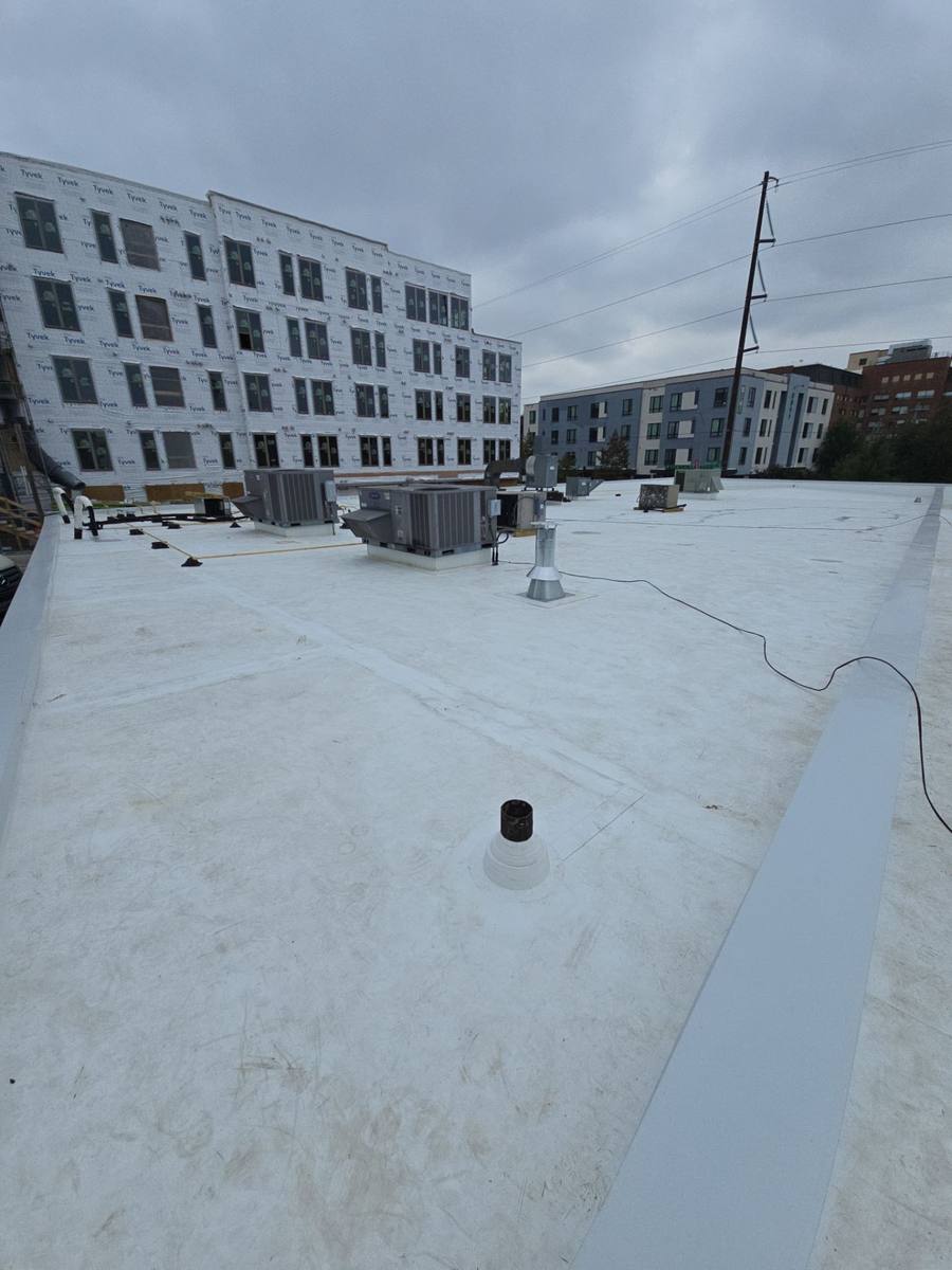 New flashing around HVAC curb on TPO flat roof in Raleigh, NC