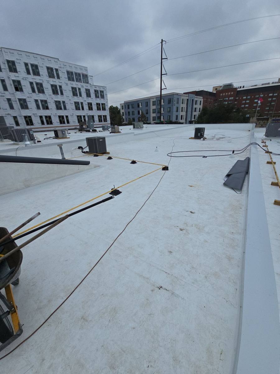 Heat-welded TPO seams on flat roof in Raleigh, NC